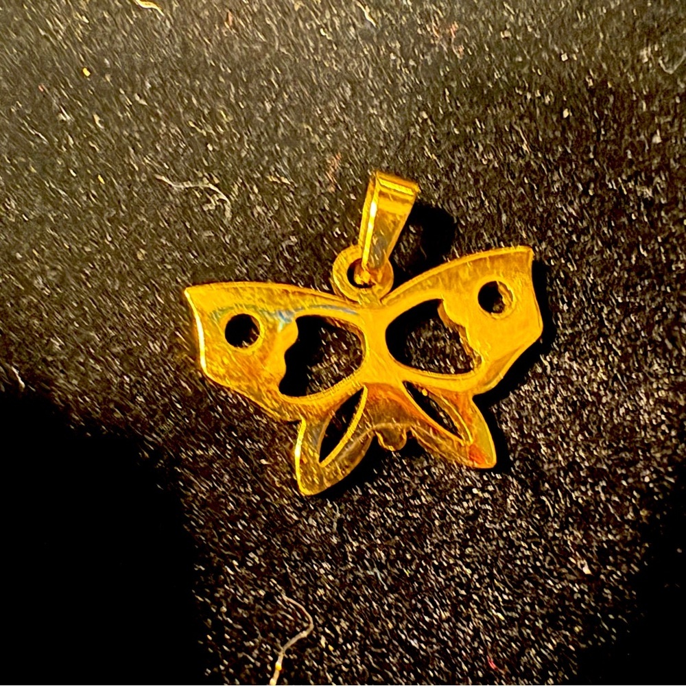 Beautiful 🤩 Titanium Gold Butterfly pendant